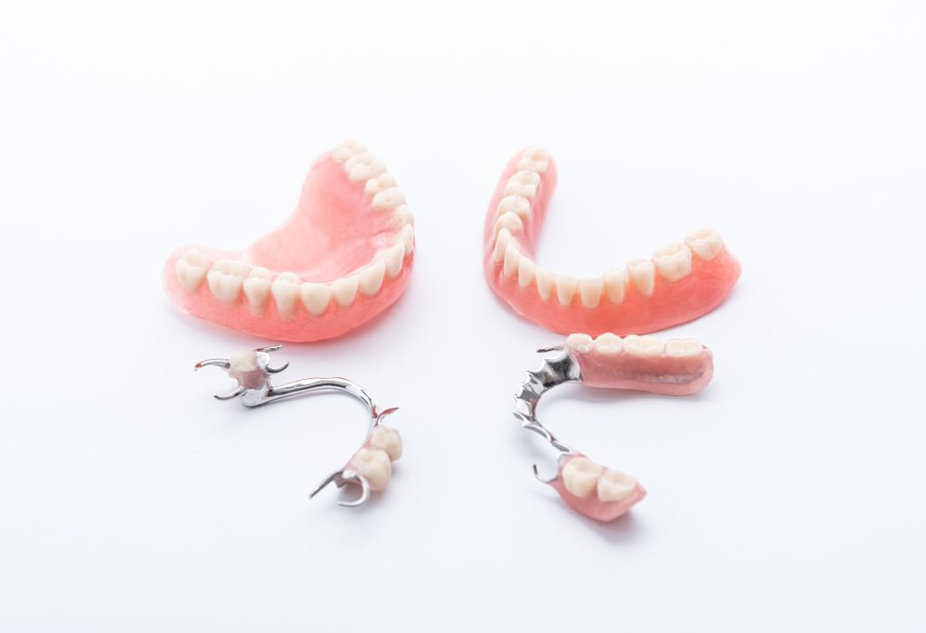 Set,Of,Dentures,On,White,Background Set,Of,Dentures,On,White,Background